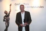 Thorsten Weimann mit Finalistenpreis für die fat IT solutions GmbH. (Foto Boris Löffert)